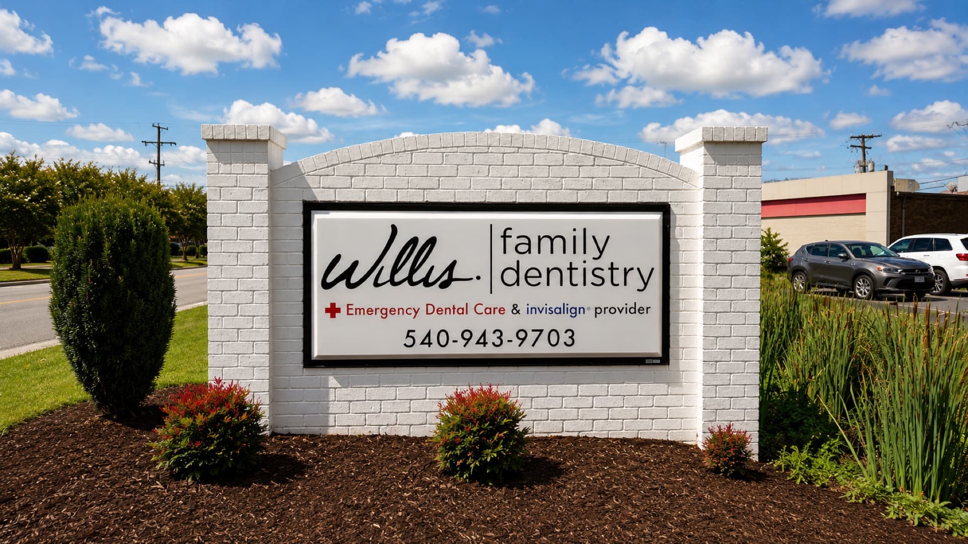 Willis Family Dentistry monument sign on Pelham Drive — emergency dental care and Invisalign provider, 540-943-9703